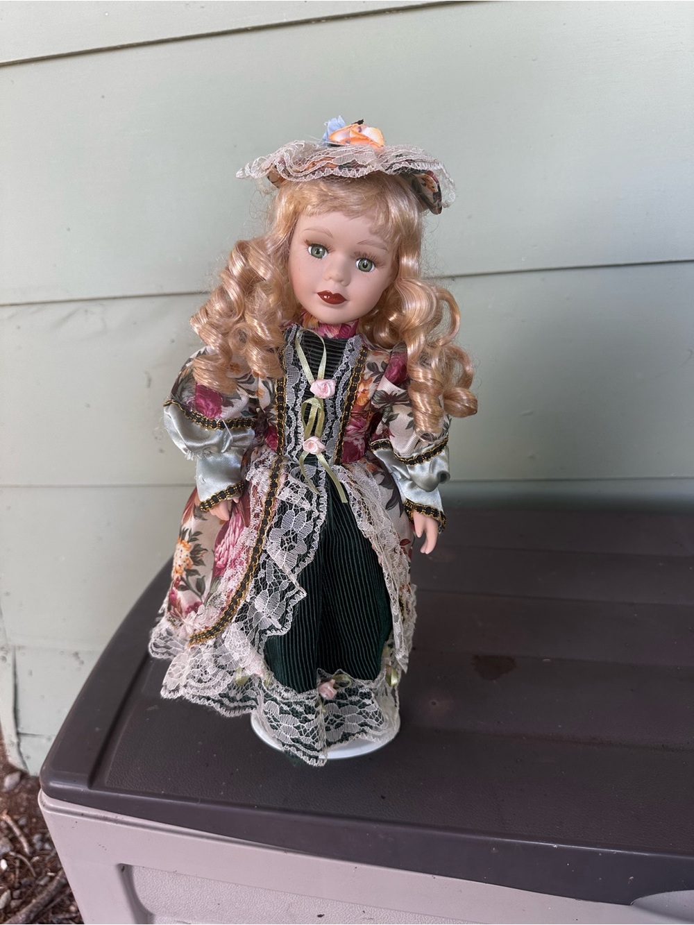 Porcelain Victorian-Style Girl Doll in Green and Floral Dress